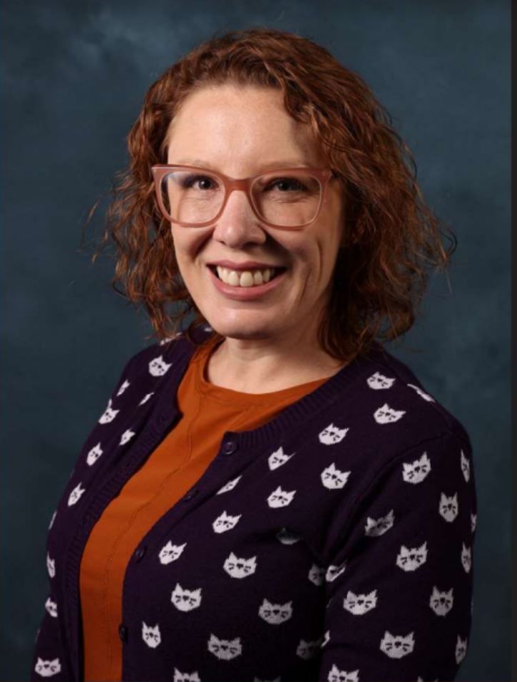 Headshot including shoulders and head of Colleen Moore, ARNP, who provides diagnosis and treatment of mental and behavioral health conditions.